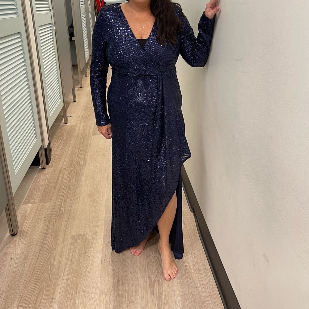 Stunning Navy blue side slit full sequin dress.